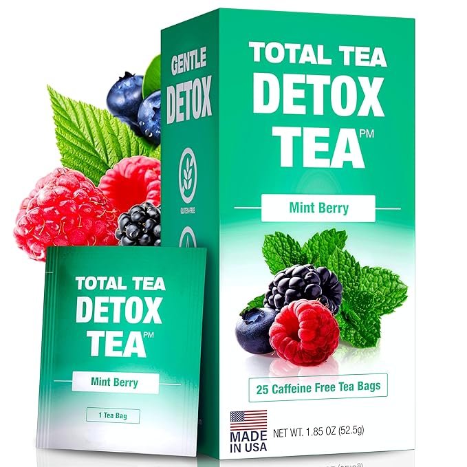A warm cup of detox green tea with lemon and mint on a wooden table – perfect morning belly fat cleanse.